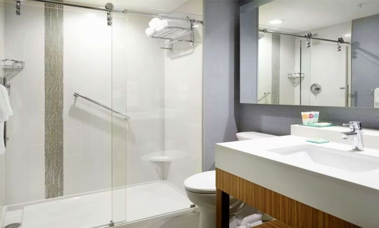 Guest bathroom with shower at Hyatt Place Jacksonville / St. Johns Town Center.