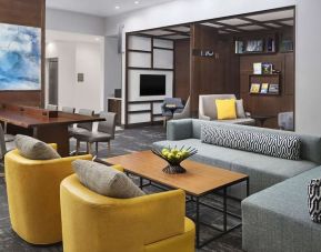 Lobby and coworking lounge at Hyatt Place Jacksonville / St. Johns Town Center.