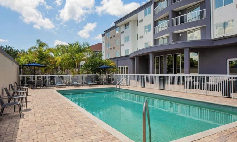 Refreshing outdoor pool at Courtyard By Marriott Tampa Oldsmar.