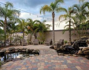 Seats available in koi pond at Courtyard By Marriott Tampa Oldsmar.