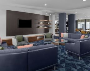 Lobby and coworking lounge at Courtyard By Marriott Tampa Oldsmar.