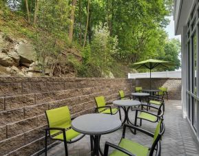 Outdoor seats available at SpringHill Suites Tuckahoe.