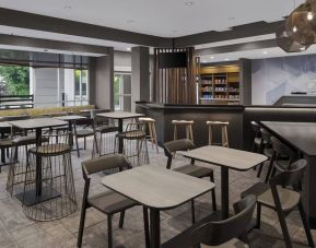 Lobby and coworking lounge at SpringHill Suites Tuckahoe.