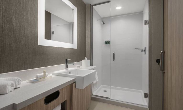 Guest bathroom with shower at SpringHill Suites Tuckahoe.