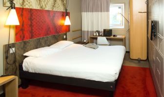 Standard day use room with king bed and work desk at ibis Leicester City.