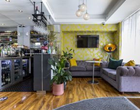 Hotel bar with lounge area at Hotel Shepherds Bush London.