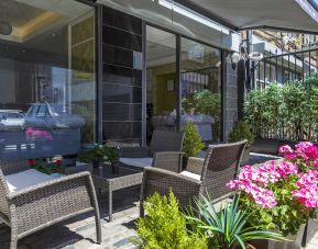 Outdoor seating at Hotel Shepherds Bush London.