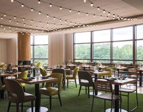 Dining area perfect for coworking at Renaissance Raleigh North Hills Hotel.