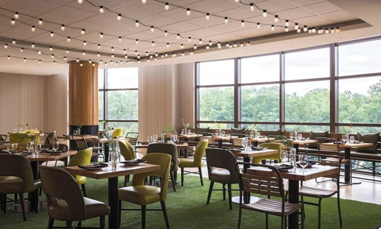 Dining area perfect for coworking at Renaissance Raleigh North Hills Hotel.