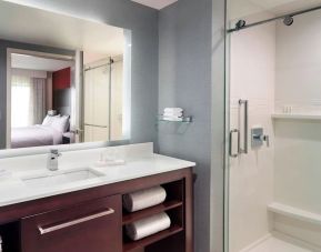 Guest bathroom with shower at Residence Inn Columbus.