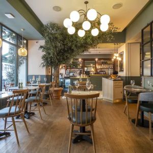 Dining area at Indigo London-Paddington Hotel.