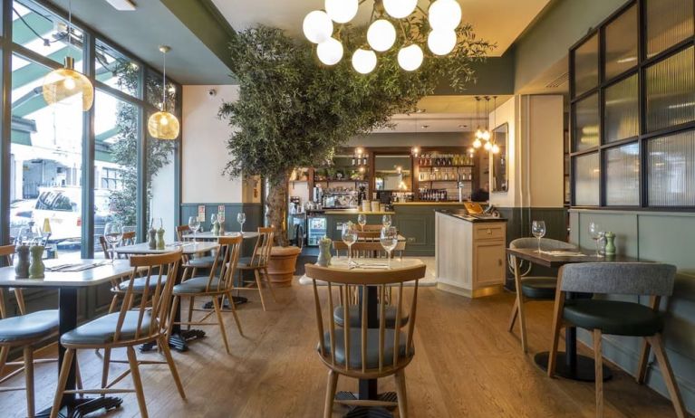 Dining area at Indigo London-Paddington Hotel.