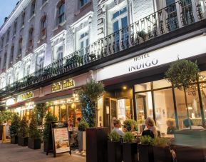 Outdoor seating area at Indigo London-Paddington Hotel.