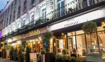 Outdoor seating area at Indigo London-Paddington Hotel.