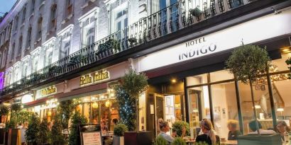 Outdoor seating area at Indigo London-Paddington Hotel.