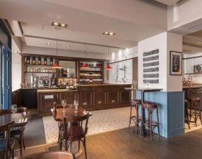 Hotel bar and dining area at Mercure London Hyde Park Hotel.