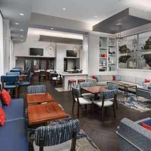 Lobby and coworking lounge at Hampton Inn Washington DC / White House.