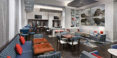 Lobby and coworking lounge at Hampton Inn Washington DC / White House.