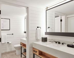 Guest bathroom with shower at The Inn At Saratoga, Tapestry Collection By Hilton.