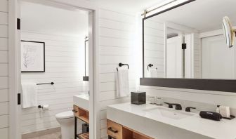 Guest bathroom with shower at The Inn At Saratoga, Tapestry Collection By Hilton.