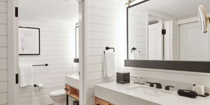 Guest bathroom with shower at The Inn At Saratoga, Tapestry Collection By Hilton.