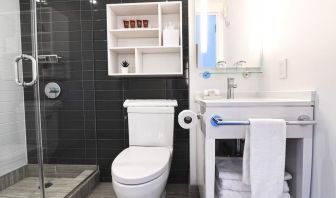 Guest bathroom with shower at Edge Hotel NYC.