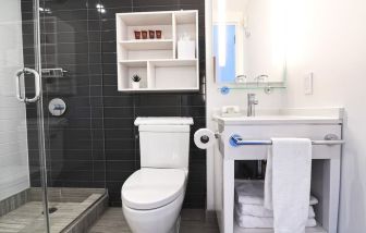 Guest bathroom with shower at Edge Hotel NYC.