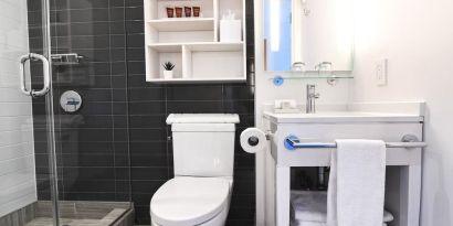 Guest bathroom with shower at Edge Hotel NYC.