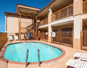 Refreshing outdoor pool at Days Inn By Wyndham San Antonio Northwest/Seaworld.