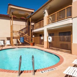 Refreshing outdoor pool at Days Inn By Wyndham San Antonio Northwest/Seaworld.