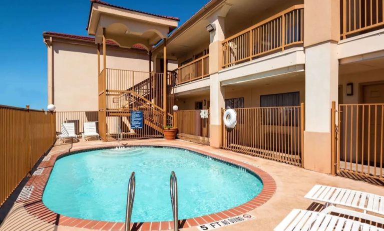 Refreshing outdoor pool at Days Inn By Wyndham San Antonio Northwest/Seaworld.