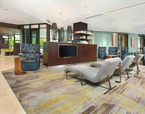 Lobby and coworking lounge at Courtyard By Marriott Redwood City.