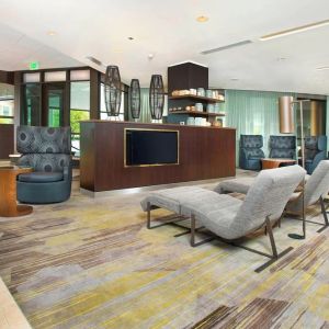 Lobby and coworking lounge at Courtyard By Marriott Redwood City.