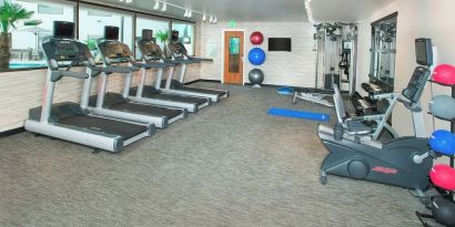 Fitness center available at Courtyard By Marriott Redwood City.