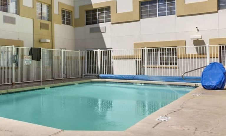 Refreshing outdoor pool at Comfort Suites Phoenix Airport.