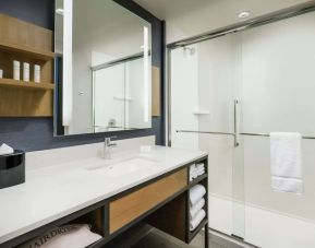 Guest bathroom with shower at Hilton Garden Inn Sunnyvale.