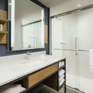 Guest bathroom with shower at Hilton Garden Inn Sunnyvale.