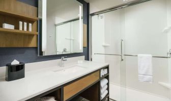 Guest bathroom with shower at Hilton Garden Inn Sunnyvale.