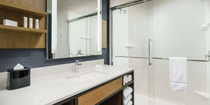 Guest bathroom with shower at Hilton Garden Inn Sunnyvale.