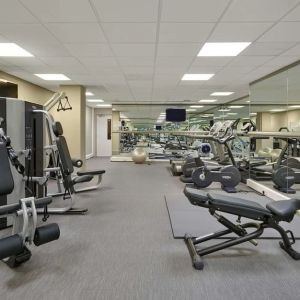 Fully equipped fitness center at Hyatt Place London Heathrow Airport.