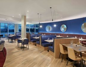 Dining area at Hyatt Place London Heathrow Airport.