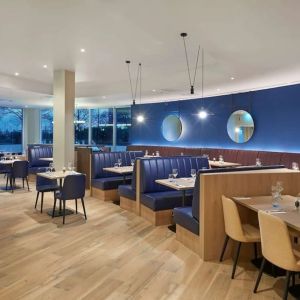 Dining area at Hyatt Place London Heathrow Airport.