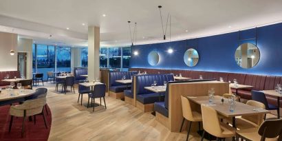 Dining area at Hyatt Place London Heathrow Airport.