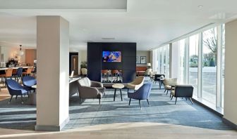 Bright and comfortable lobby lounge at Hyatt Place London Heathrow Airport.