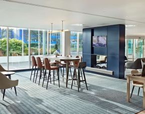 Lobby workspace with computer and printer at Hyatt Place London Heathrow Airport.