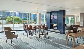 Lobby workspace with computer and printer at Hyatt Place London Heathrow Airport.