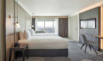 Bright and spacious day use twin room with work desk and private bathroom at Hyatt Place London Heathrow Airport.