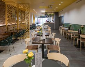 Dining area with comfortable seating perfect for co-working at The Wesley Euston.