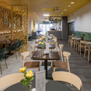 Dining area with comfortable seating perfect for co-working at The Wesley Euston.