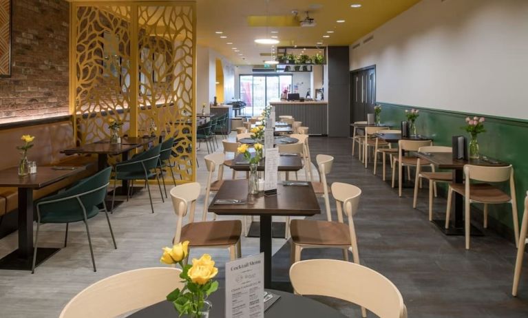 Dining area with comfortable seating perfect for co-working at The Wesley Euston.